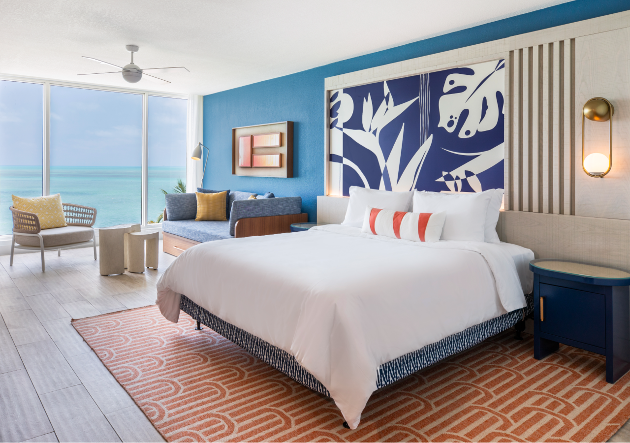 Reef Suite, 1 King, Sofabed, Balcony + Jr. Suite 1 King Oceanfront