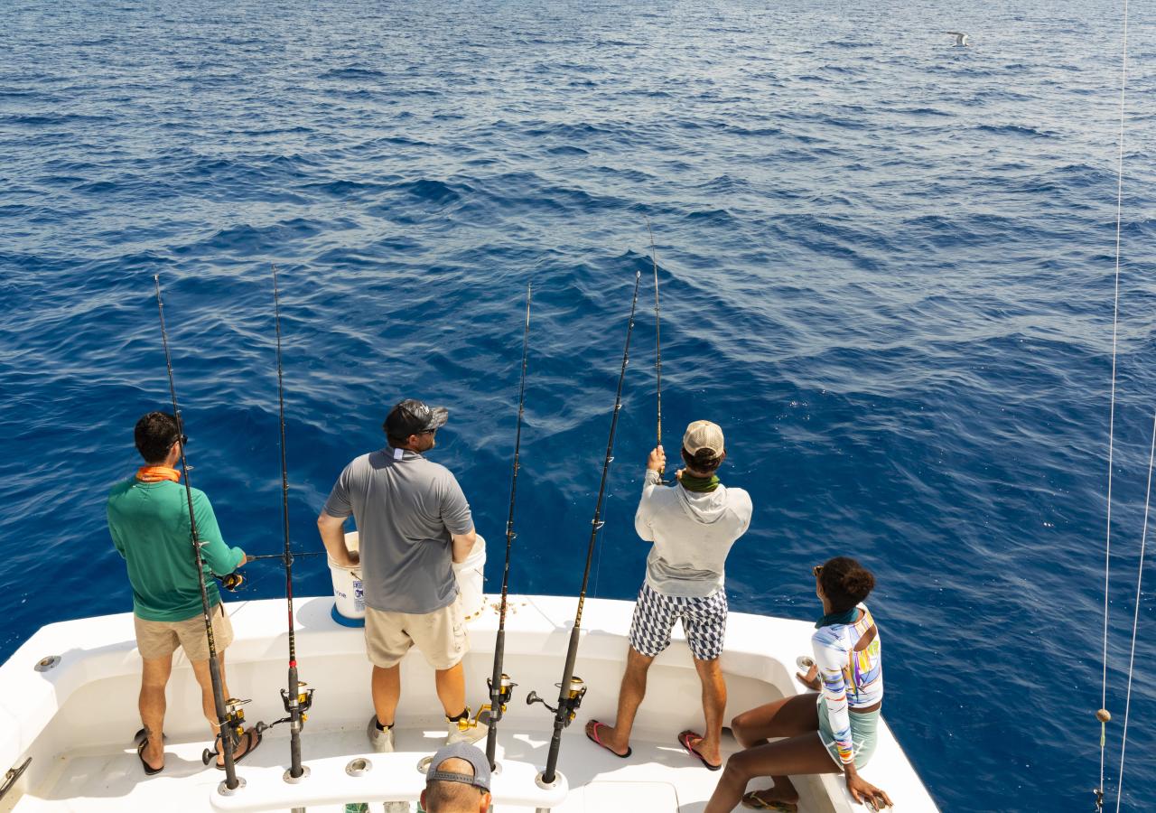 People fishing from a boat