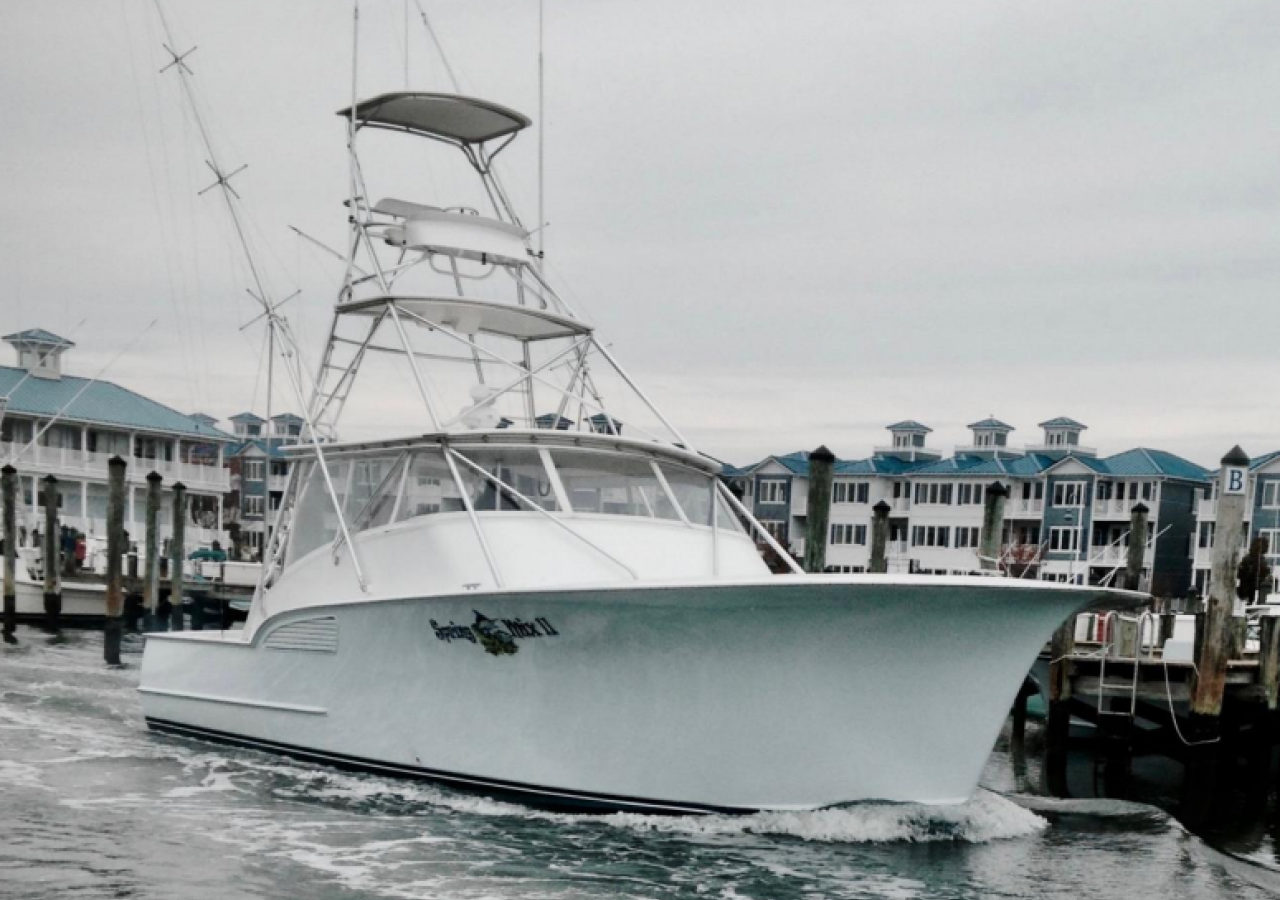 A charter boat in a marina.